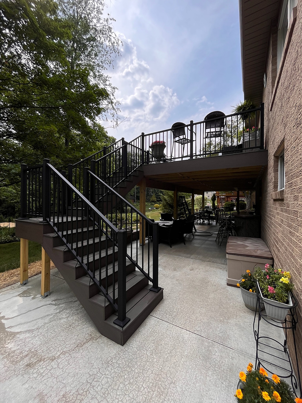 unfinished deck showing side of the deck with stairs